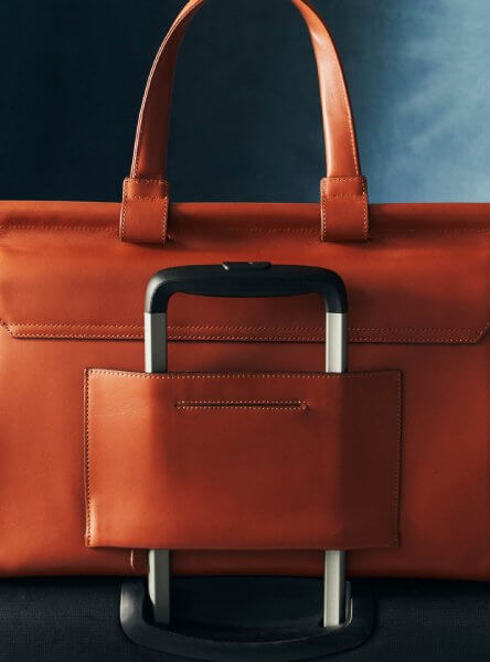 Suitcase attachment sleeve